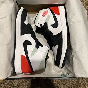 Jordan Black, White, and Red Athletic Shoes